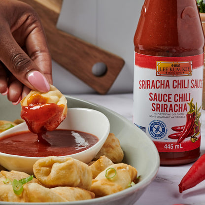 Lee Kum Kee Sriracha Chili Sauce Plastic Bottle (18 oz - 1 Pack), Gluten Free, Non-GMO, Vegan, Spicy, Hot and Sweet with a Hint of Garlic, Perfect for Stir-Fries, Dipping Sauces, Drizzling, Noodles, Marinades, and Dumplings