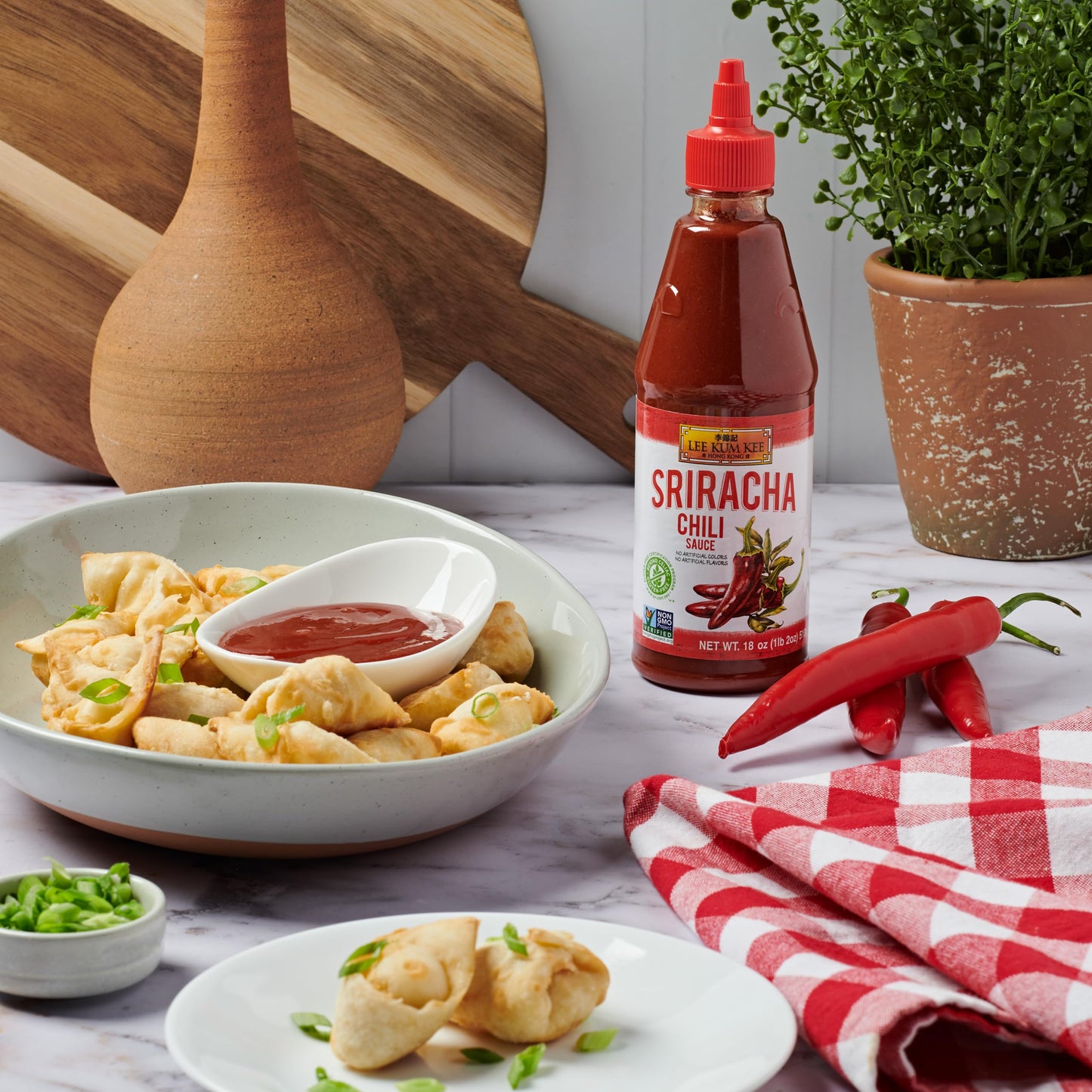 Lee Kum Kee Sriracha Chili Sauce Plastic Bottle (18 oz - 1 Pack), Gluten Free, Non-GMO, Vegan, Spicy, Hot and Sweet with a Hint of Garlic, Perfect for Stir-Fries, Dipping Sauces, Drizzling, Noodles, Marinades, and Dumplings