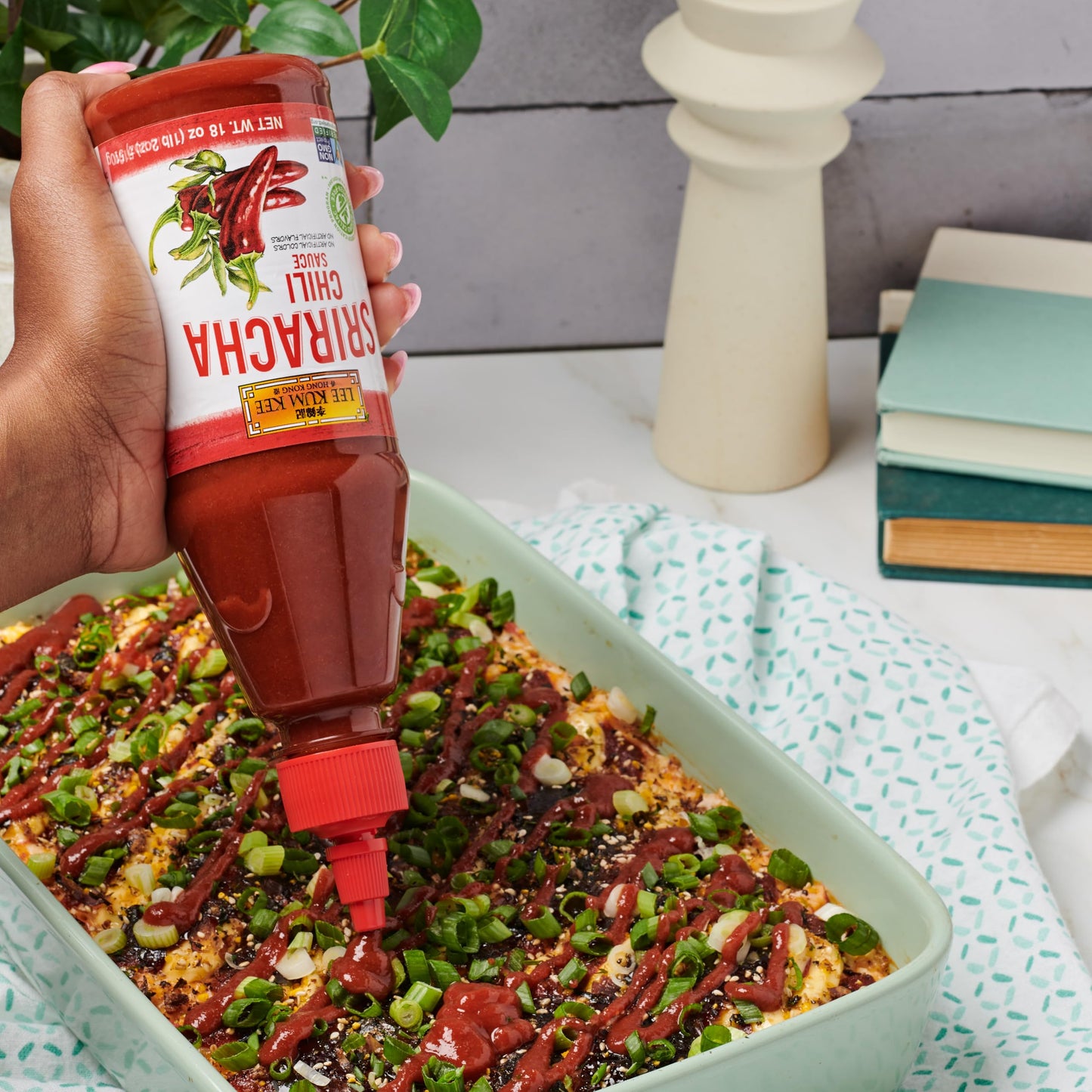 Lee Kum Kee Sriracha Chili Sauce Plastic Bottle (18 oz - 1 Pack), Gluten Free, Non-GMO, Vegan, Spicy, Hot and Sweet with a Hint of Garlic, Perfect for Stir-Fries, Dipping Sauces, Drizzling, Noodles, Marinades, and Dumplings